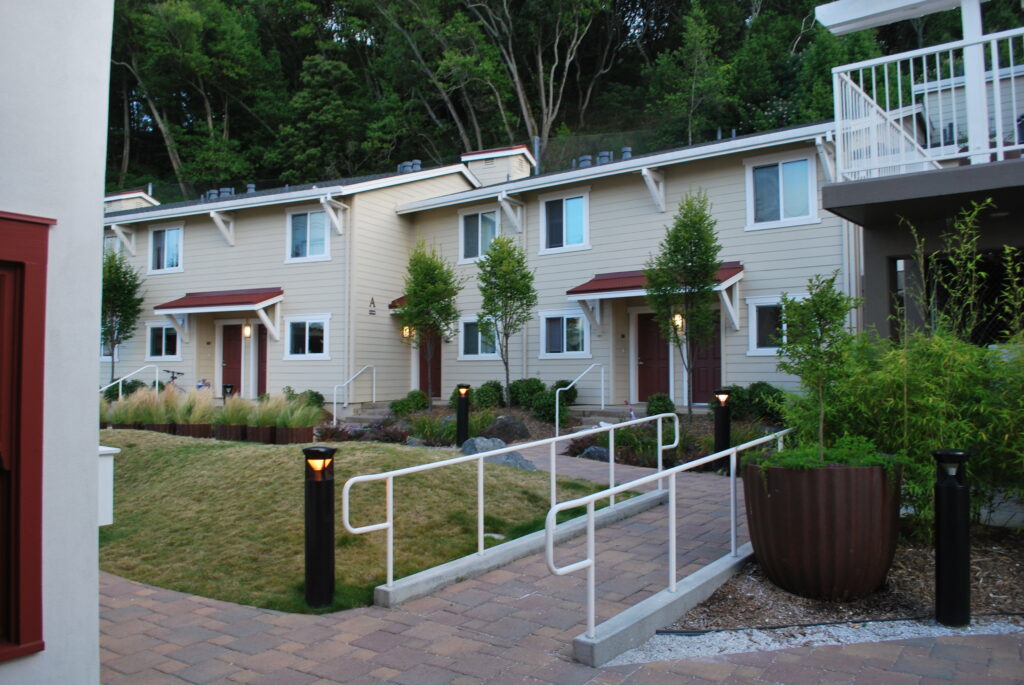 exterior of fireside apartments with a walking and railing