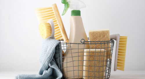 a basket of cleaning supplies