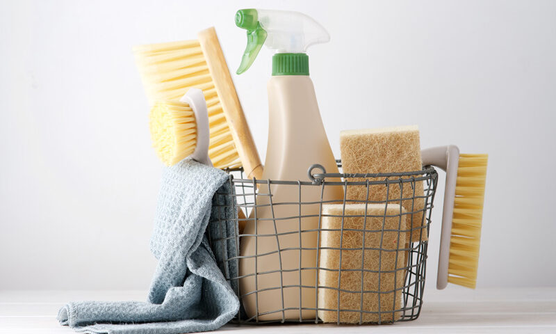 a basket of cleaning supplies