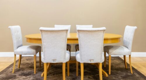 dining table and six white chairs