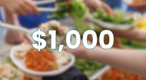 Hands serving fresh food to people holding plates