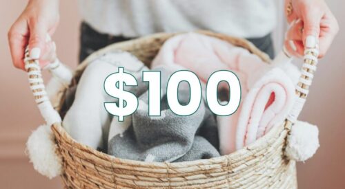 Two hands holding basket of blankets