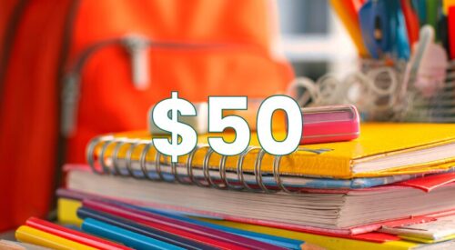 Red backpack with school supplies