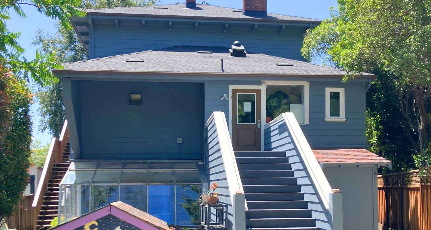 Building with blue paint and white trim